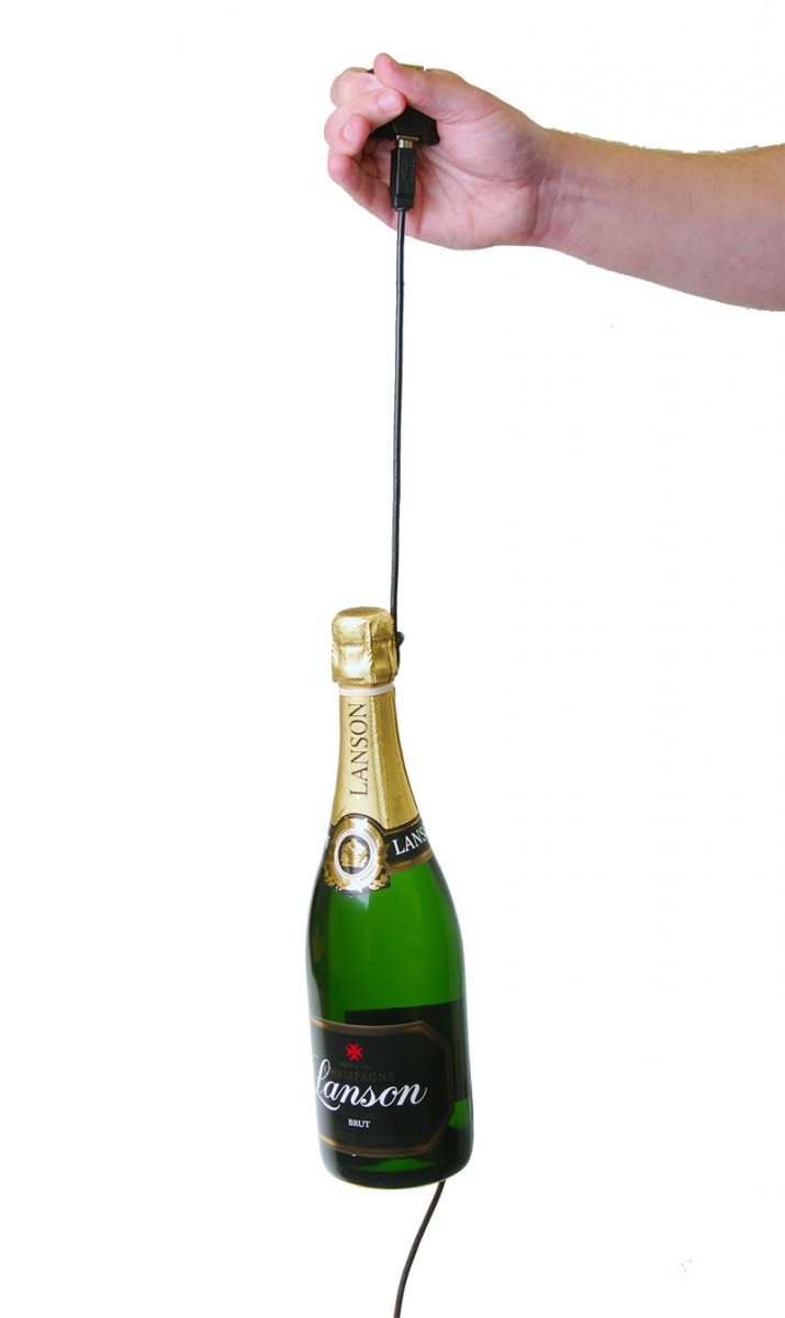 US-235 High Retention Cable holding the weight of a champagne bottle